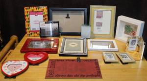 lot 426 image: Mixed lot of photo frames shadow box and more see photo