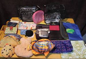 lot 451 image: Makes a lot of change purses and bags some brands eagle CreekfossilVera Bradley and more