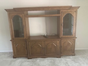lot 25 image: ENTERTANMENT WALL UNIT  - SIDE PIECES  76 H X 24W X 17 D  X 2  & CENTER CONSOLE IS 32H X 50L X 24D - UNIT HAS SHELVES, & CABINETS - 98 IN TOTAL LENGTH - DISASSEBLED FOR TRANSPORT