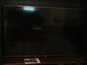 lot 35 image: LG 55 TELEVISION  W BOOK and REMOTE