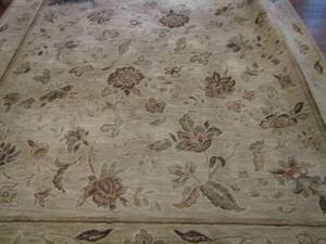 lot 23 image: Shaw Alexander 7ft9ft area rug very nice beige in color