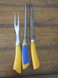 lot 95 image: Vintage BAKELITE Yellow handle CARVING SET -  Knife, Fork and Sharpener