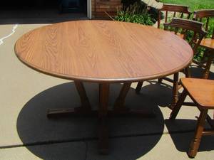 lot 5 image: A. BRYANT RANCH OAK Furniture Co.- OVAL Dining table(54 D) with 5 chairs Very beautiful piece of furniture well taken care of  X $$$$
