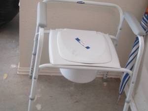 lot 135 image: bedside potty or can be used for deer stand camping toilet