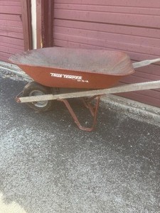 lot 144 image: TRUE TEMPER WHEEL BARROW 4 CU FT - TIRE IS LOW