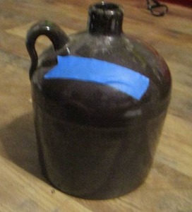 lot 72 image: BROWN MILK JUG