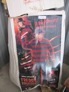 lot 1 image: Freddy Kruger 6ft tall motion activated yard dcor new in original box, box has some damages