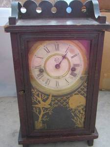 lot 116 image: table top clock , name unreadable