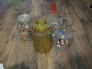 lot 136 image: mickey and friends vase, yellow glass with lid jar- big glass says I BET YOU CANT