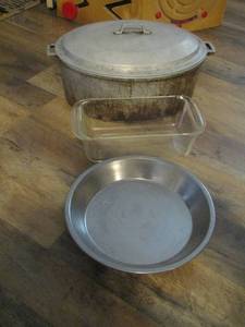 lot 138 image: heavy duty cast iron pan with lid- baking dishes