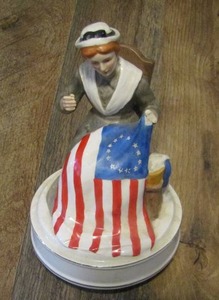 lot 143 image: BETY ROSS  sewing the American Flag Music Box