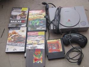 lot 153 image: SONY PLAYSTATION W CONTROLLER, AND GAMES