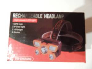 lot 22 image: RECHARGEABLE HEAD LAMP -  NEW