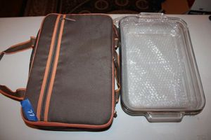 lot 77 image: Casserole baking dishes, one with lid and carrier