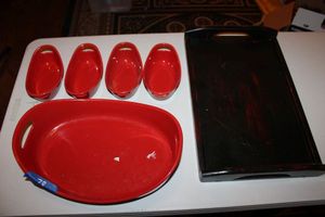 lot 78 image: Red oval bowl serving set with wood serving tray