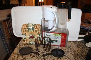 lot 88 image: Filtered pitchers, Apple peeler, paper towel holder, cast iron mini skillets