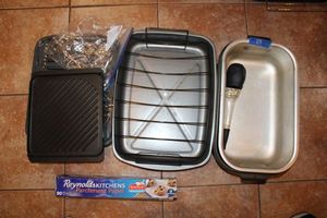 lot 83 image: Roasting pans, turkey baster, rotisserie skewers
