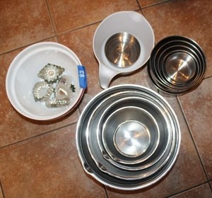 lot 82 image: Metal nesting bowl sets as shown