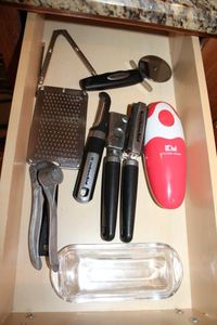 lot 86 image: Kitchen Aid utensils and butter dish