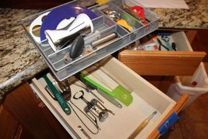 lot 87 image: Misc. utensils and mesh metal drawer organizer
