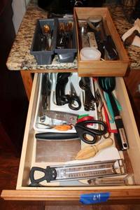 lot 64 image: Kitchen utensils and flatware, see photos