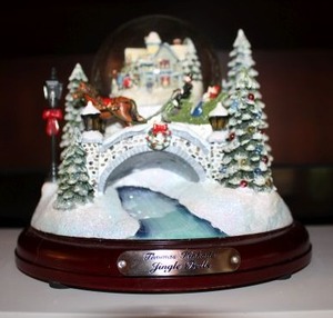 lot 101 image: Thomas Kincaid Jingle Bells illuminated musical snow globe