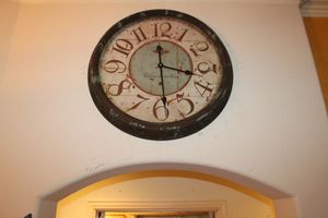 lot 32 image: Large metal circle wall clock
