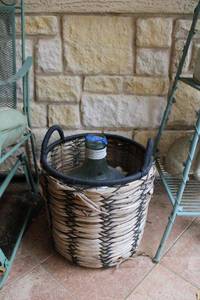 lot 182 image: Round basket with glass jar inside