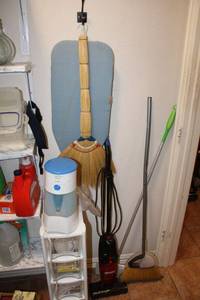 lot 38 image: Eureka vacuum and Misc. cleaning supplies