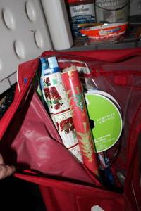 lot 331 image: Wrapping paper and red storage bag