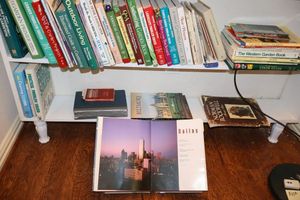 lot 302 image: Books - 2 shelves, gardening, Norman Rockwell and clear bookstand