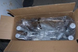 lot 13 image: Deluxe steel drop arm commode (as per box - did not assemble)