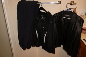 lot 128 image: Kenneth Cole Black leather jacket XL, Womens L Zero X Posur jacket with snap on hood, plus Ozark Trail L36-38 winter pants