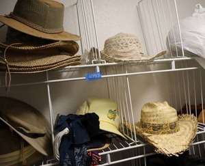 lot 197 image: Straw hats and fedora hat