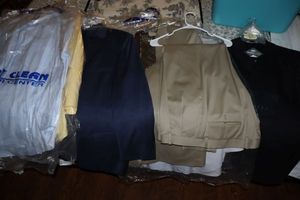 lot 205 image: Mens dress shirts and suits, mostly 48 regular, see photos