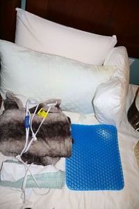 lot 249 image: Pillows and heated blankets plus gel seat cushion