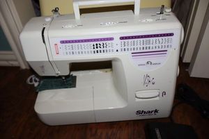 lot 253 image: Shark Euro-Pro X sewing machine with case and foot pedal