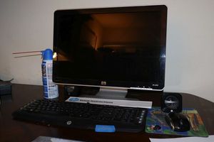 lot 218 image: HP w1907 monitor and wireless keyboard and mouse