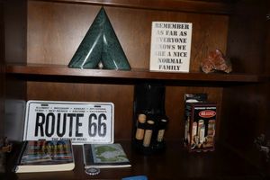 lot 223 image: Office dcor, souvenir rock, coin sorters, Route 66 map