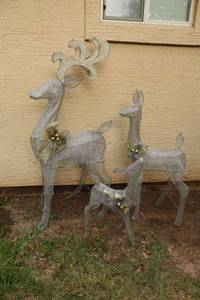 lot 166 image: outdoor decorations - Silver reindeer family