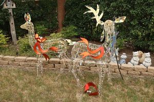 lot 162 image: Iridescent yard reindeer decorations (needs some minor fixes)