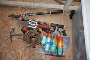 lot 156 image: Yard or garden tools plus bug spray