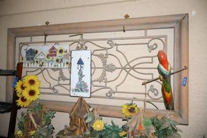 lot 158 image: Metal wall art (5-6 wide) with wood birdhouse art and parrot
