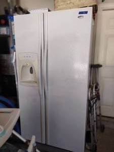 lot 2 image: Amana RefrigeratorFreezer with ice dispenser in door. Model ASD262RHRW by Maytag appliances.