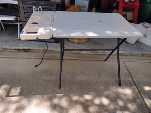 lot 317 image: Work bench, pvc stakes, tree trimmer, and sign. See all photos.