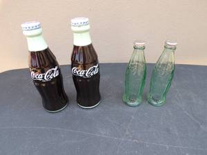 lot 64 image: 2 Sets of Coca Cola Bottle Salt and Pepper Salt and Pepper Shakers, About 5.5 High, Clear Set About 4.5 High