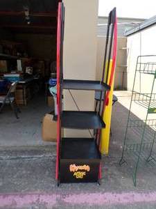 lot 35 image: Kahlua Anything Goes Red and Black 3 Shelf Metal Display Rack, About 21x16x70