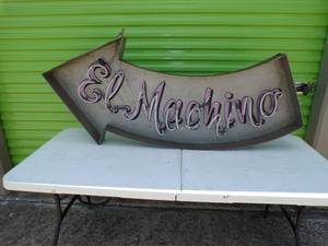 lot 55 image: El Machino Stainless Steel Neon Arrow Sign Frame, Broken Neon Tubes, About 66x28x4