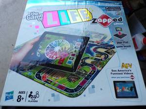 lot 107 image: The Game of Life Zapped Edition Game, Works With IPAD, IPAD Required, Untested