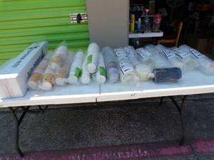 lot 119 image: Box of Unused in Sleeves,  Cups and Lids, Mixed Styles and Sizes AND 1 New in Box Model ADJ-NW-81 Dispense-Rite Dispenser With Mounting Hardware